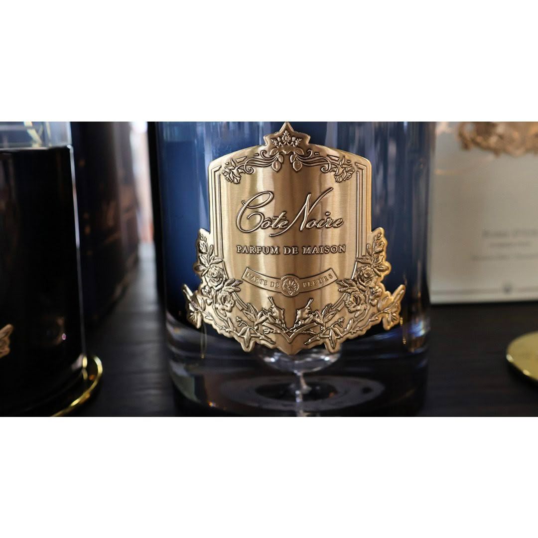 Cote-Noire-Luxury-candle-blonde Elegant Cote Noire scented candle with ornate label
