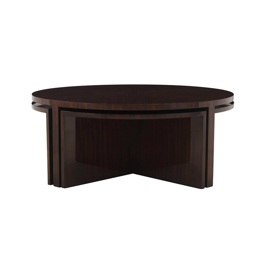 Round dark wood conference table on white background