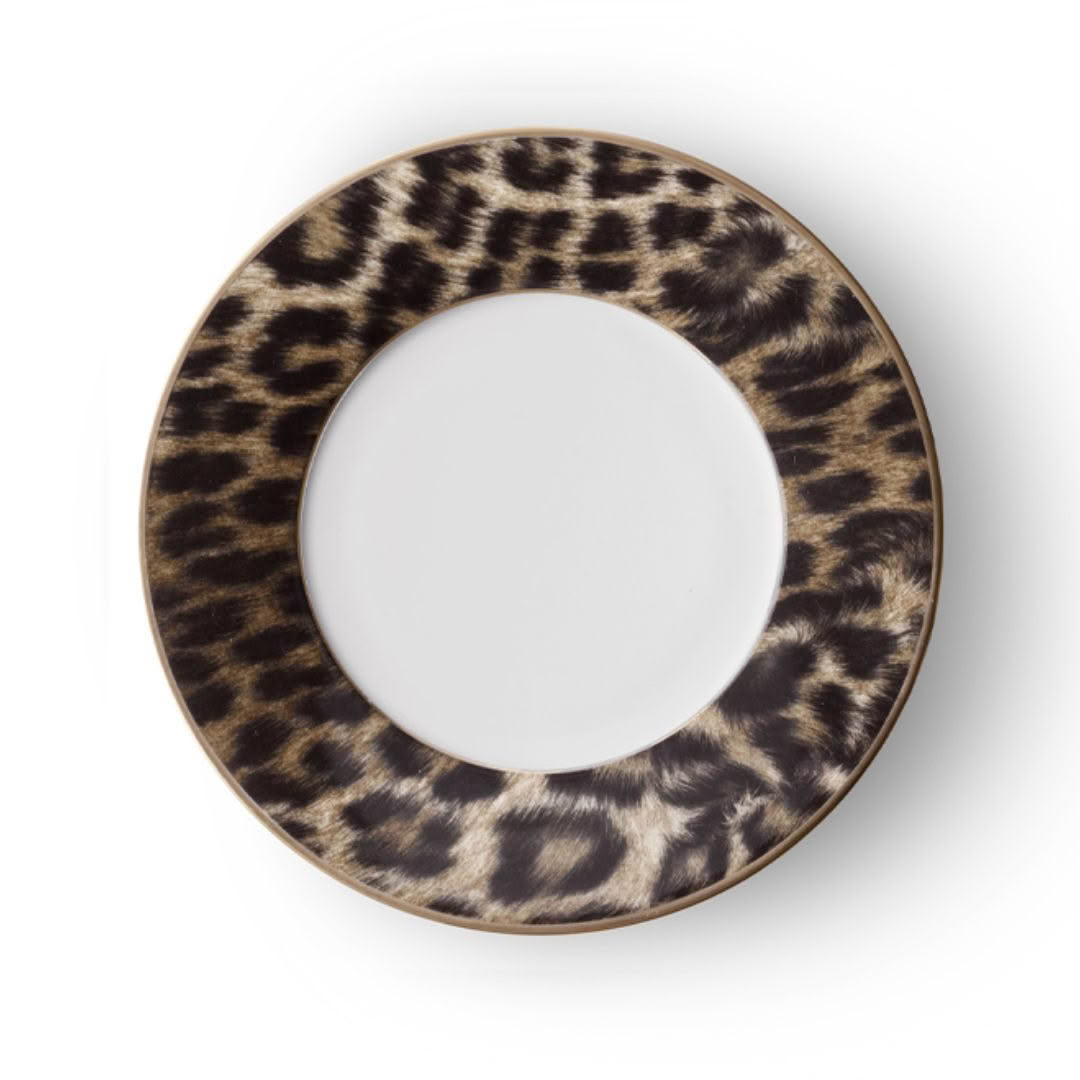 Leopard print decorative ceramic plate on white background