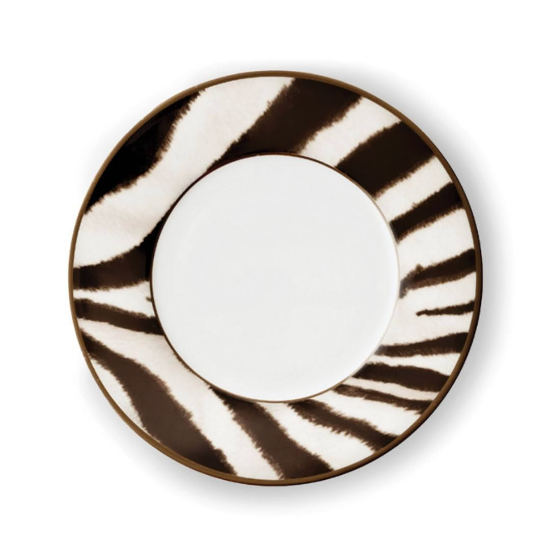 Zebra stripe patterned ceramic plate on white background