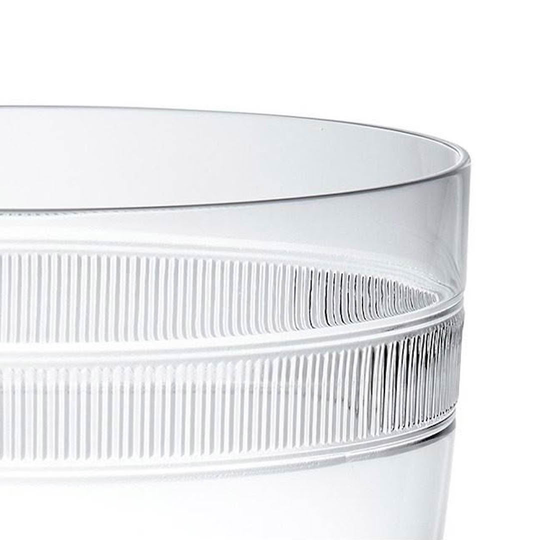 Close-up of a clear ridged plastic cup