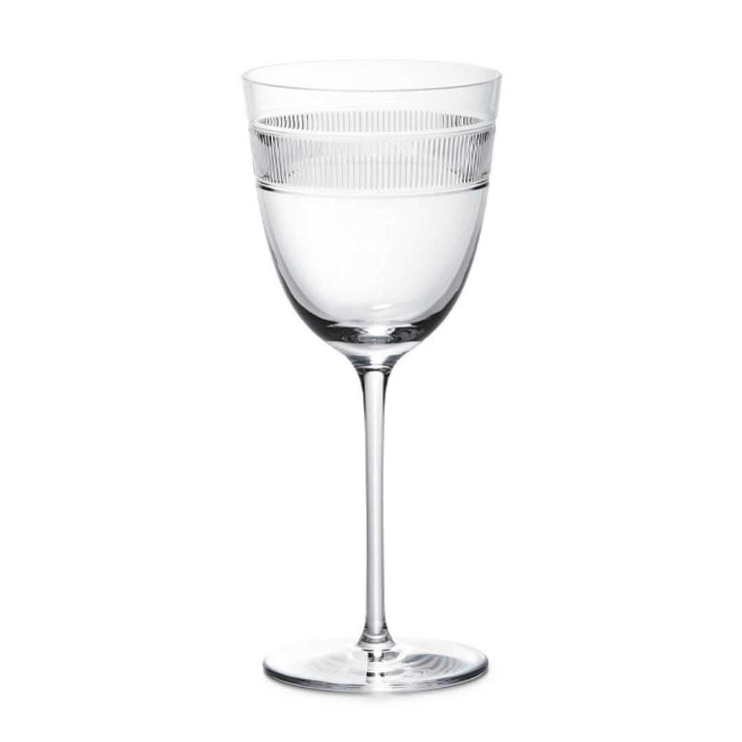 Elegant clear wine glass half filled with water