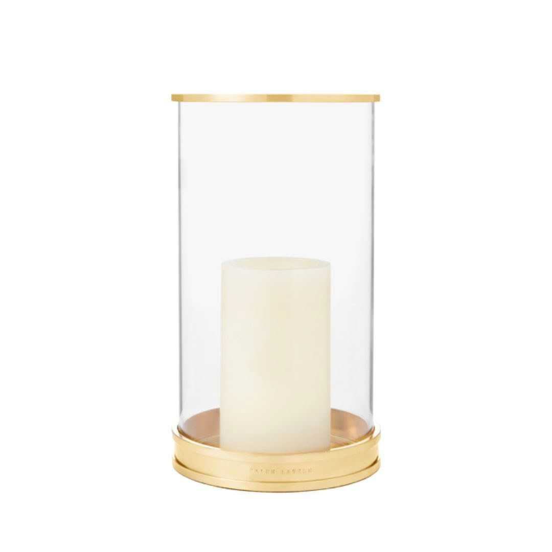 Gold and glass candle holder with white candle