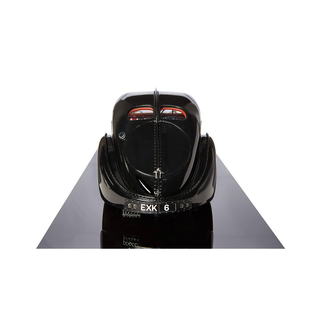 Ralph-Lauren-1938-Bug-57S_3 Rear view of classic black car on reflective surface
