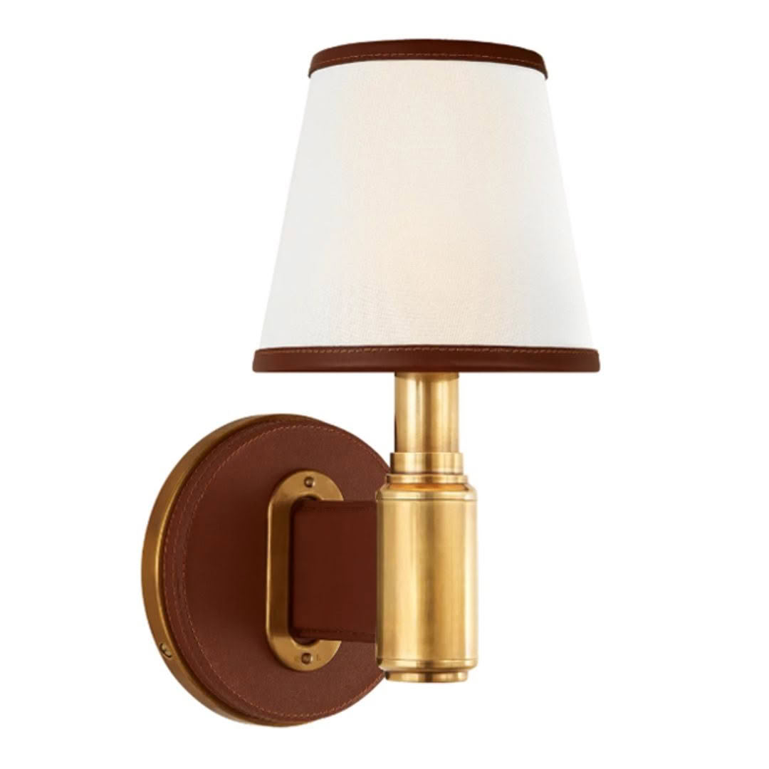 Wall-mounted brass lamp with white shade