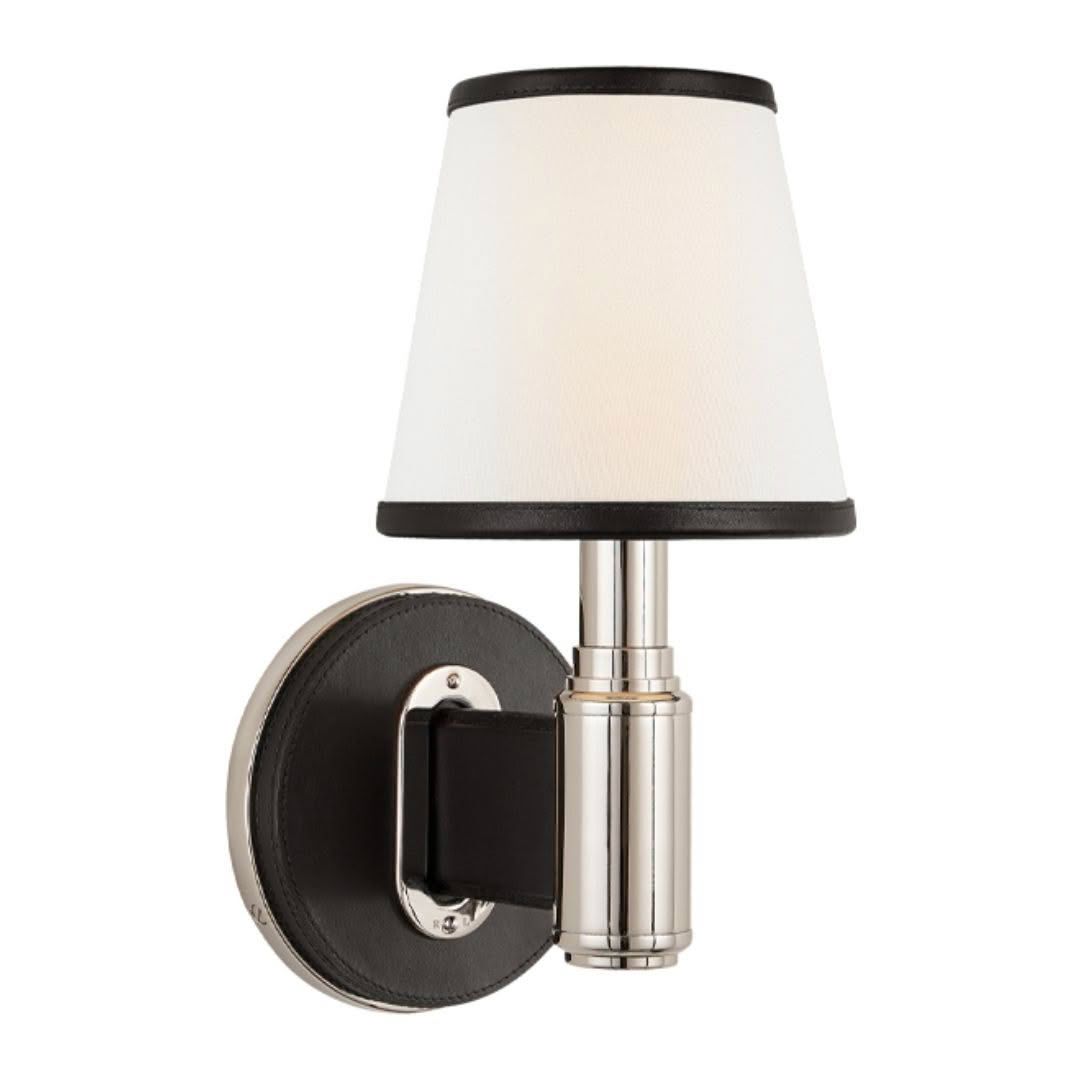 Wall-mounted sconce with white shade and chrome finish