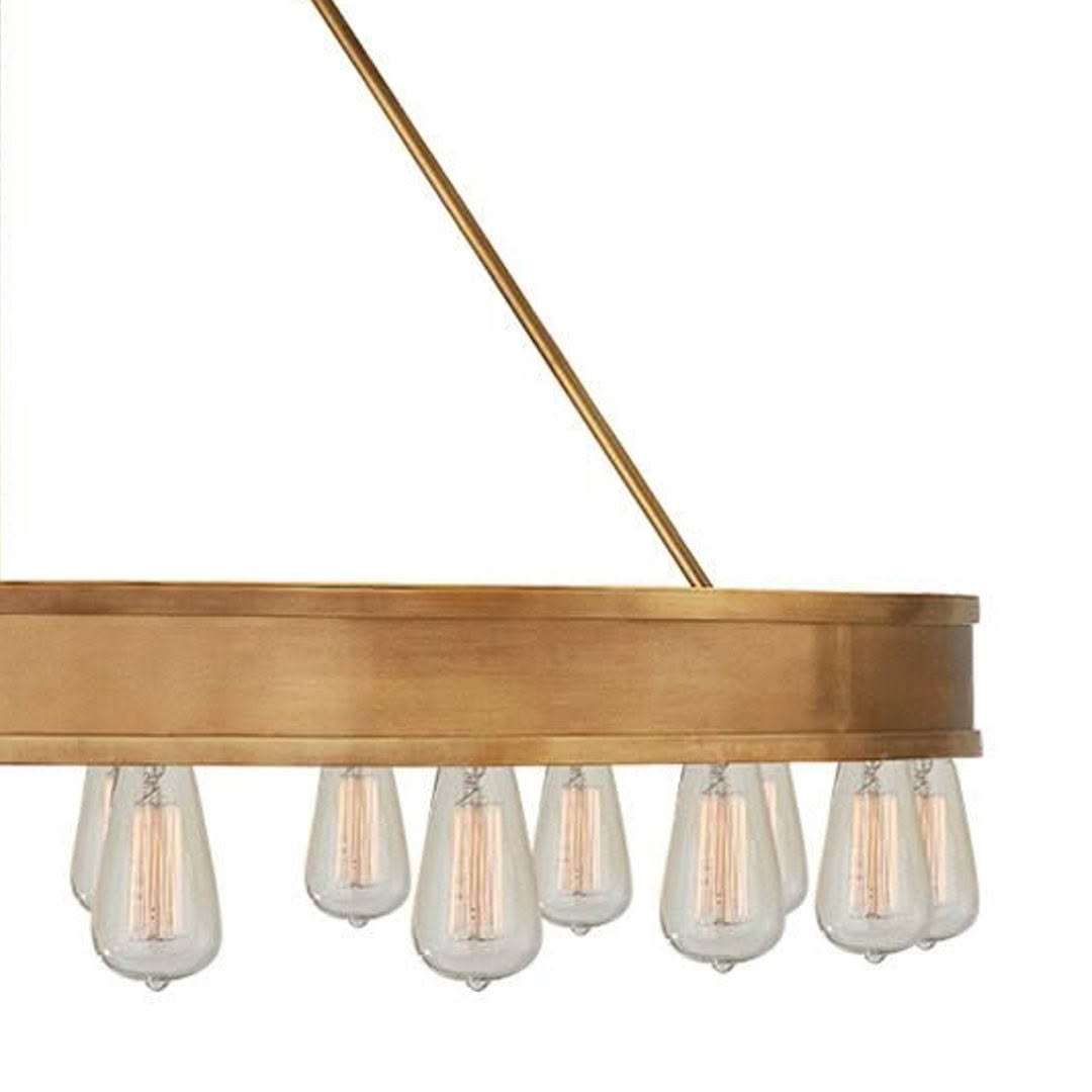 Modern gold chandelier with exposed Edison bulbs