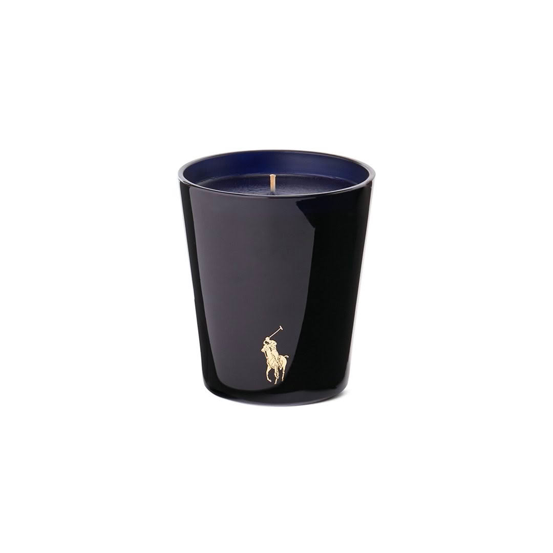 Black candle with gold logo design