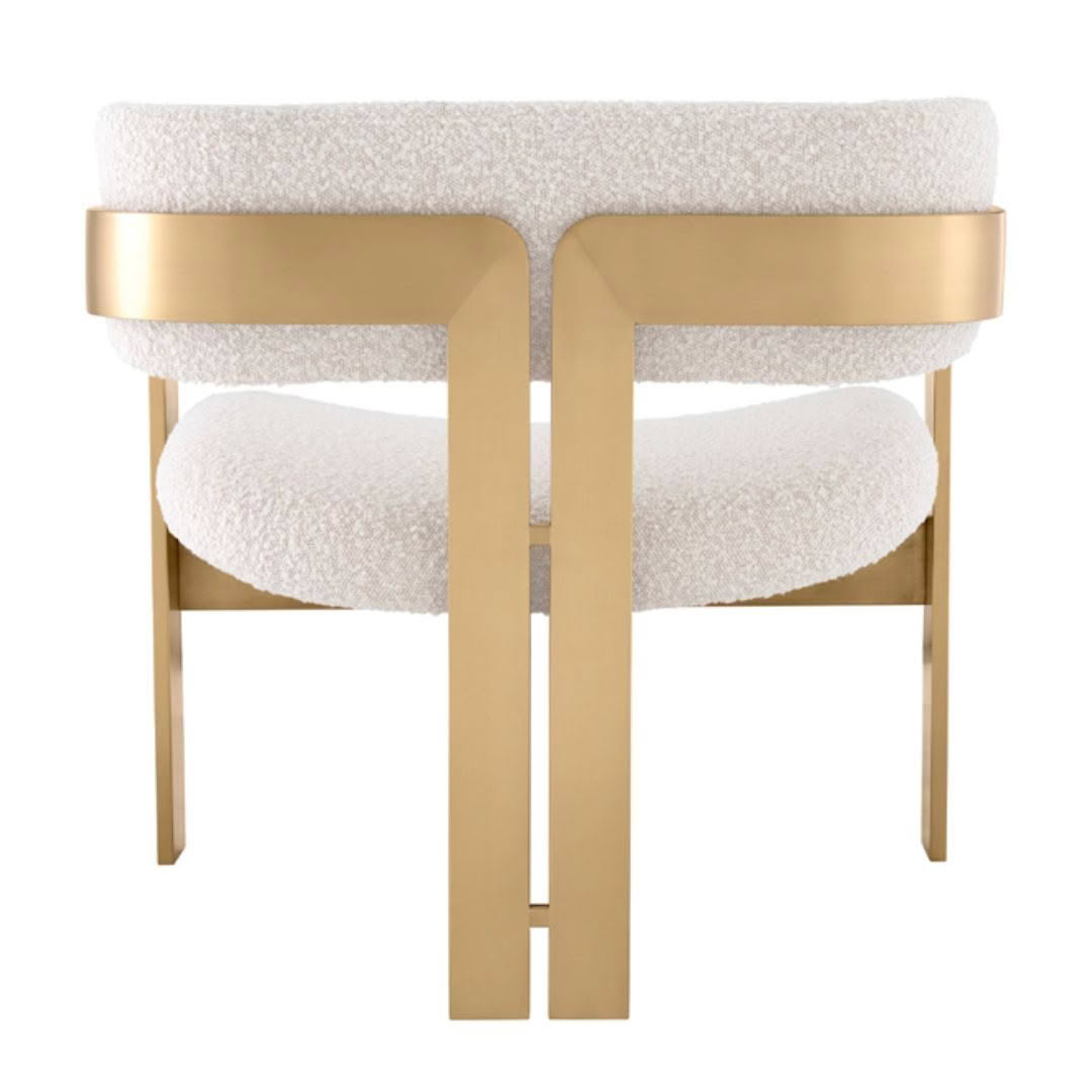 Gold frame chair with white cushions, modern design