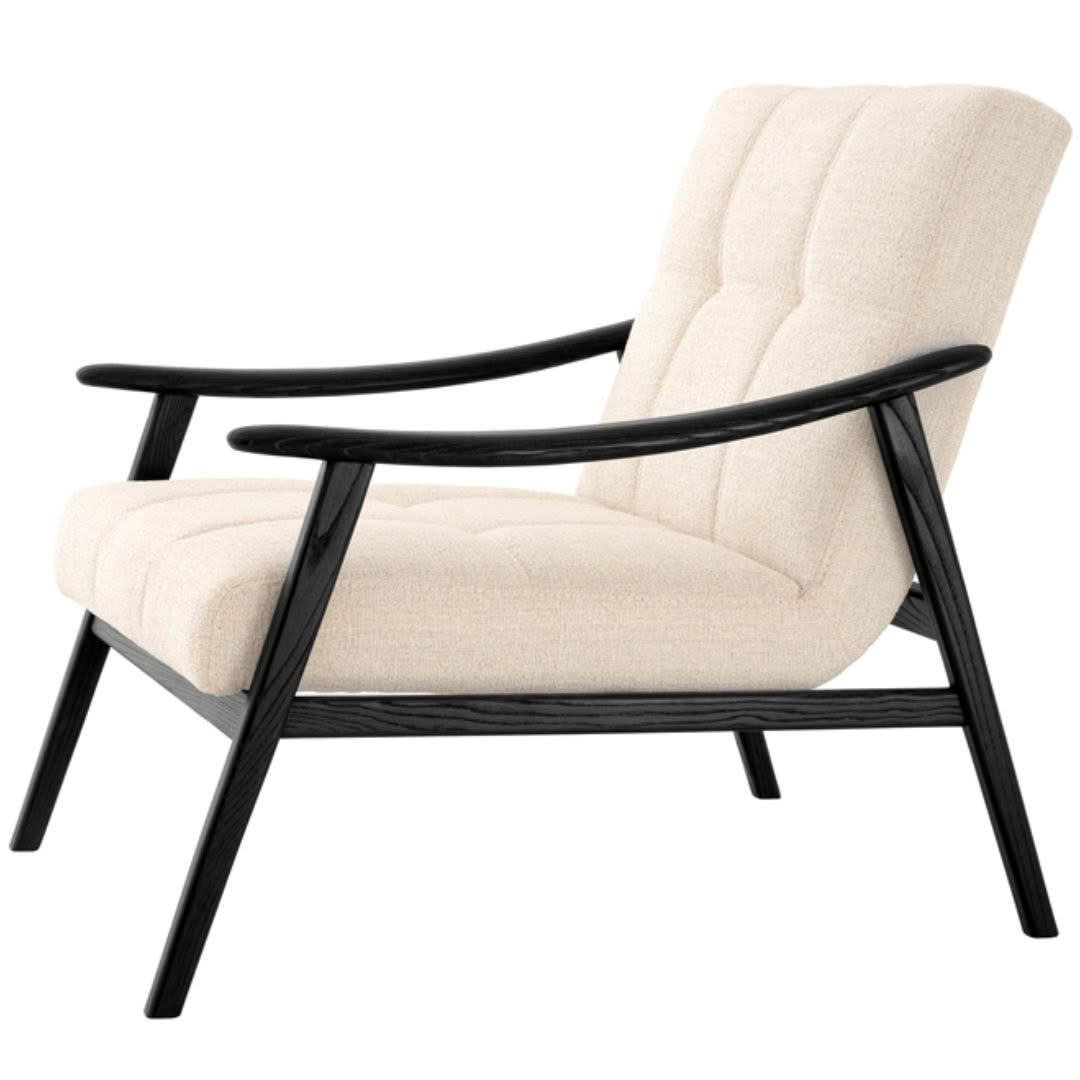Beige upholstered armchair with black wooden frame