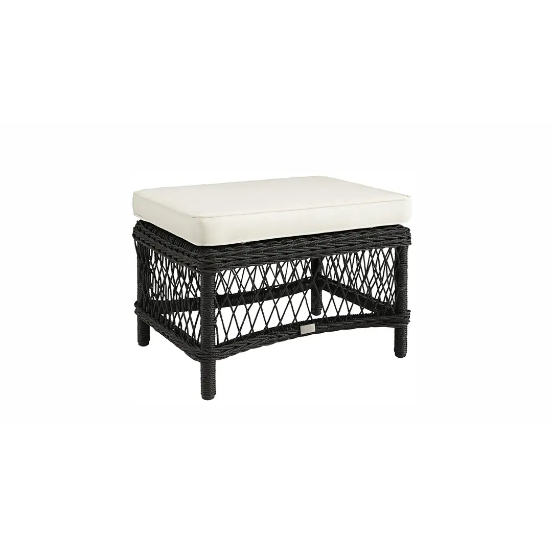 Black wicker outdoor ottoman with white cushion