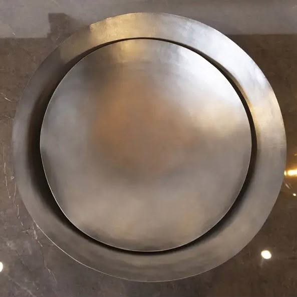 Circular metal frame design on floor