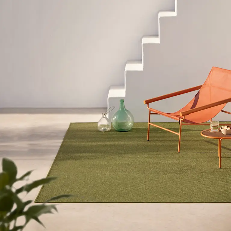 Modern minimalist lounge chair in stylish interior space.