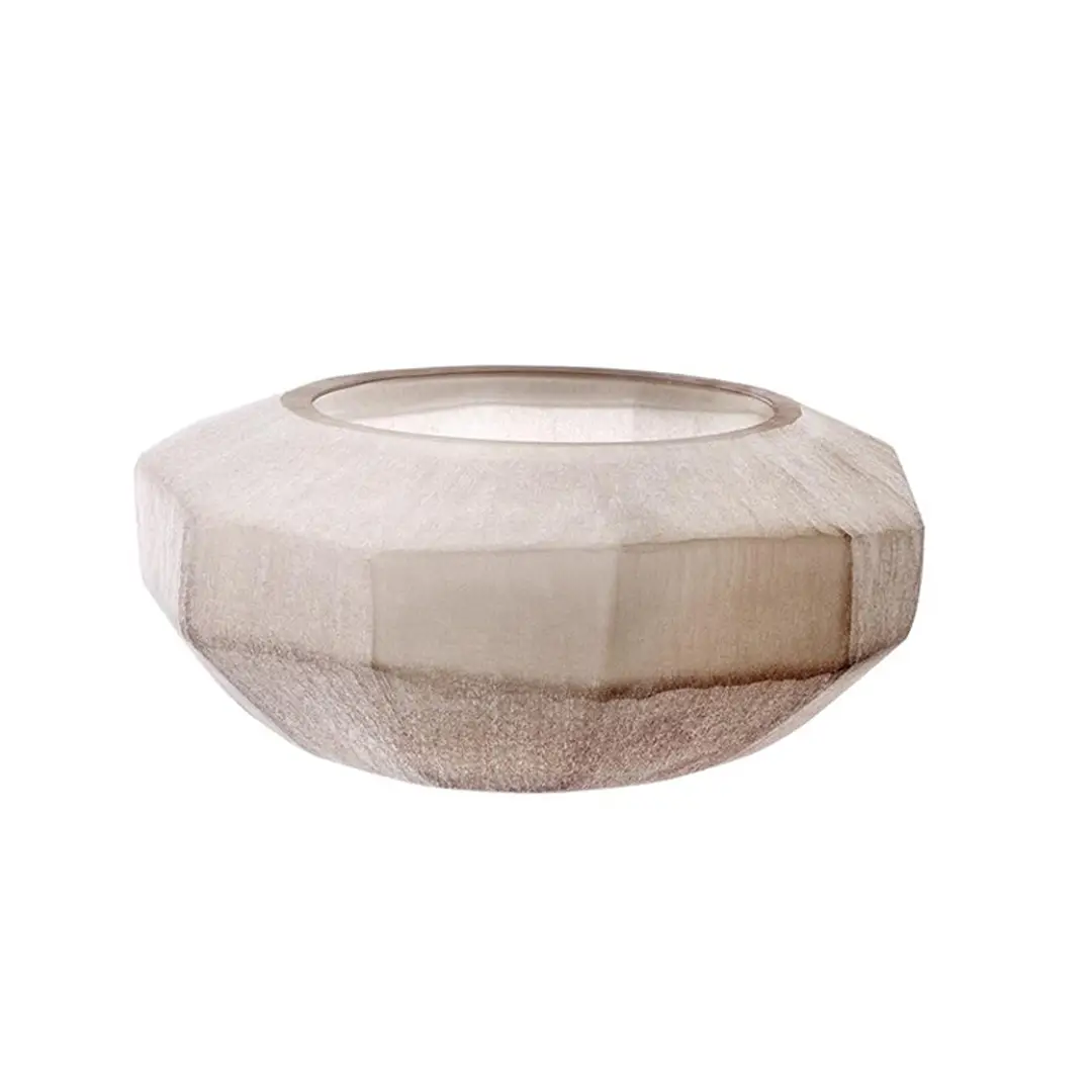 Round sandstone candle holder on white background
