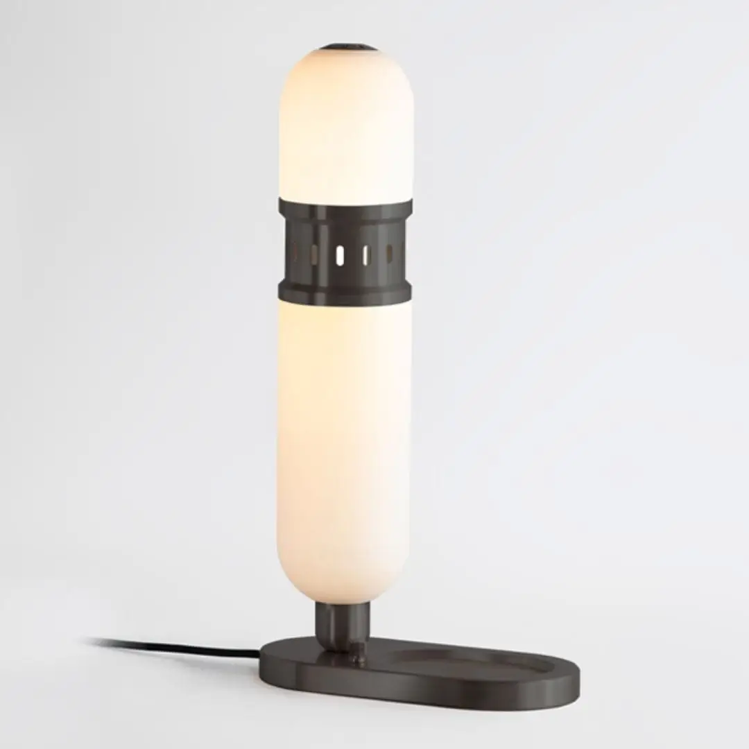 Modern table lamp with frosted glass and black base