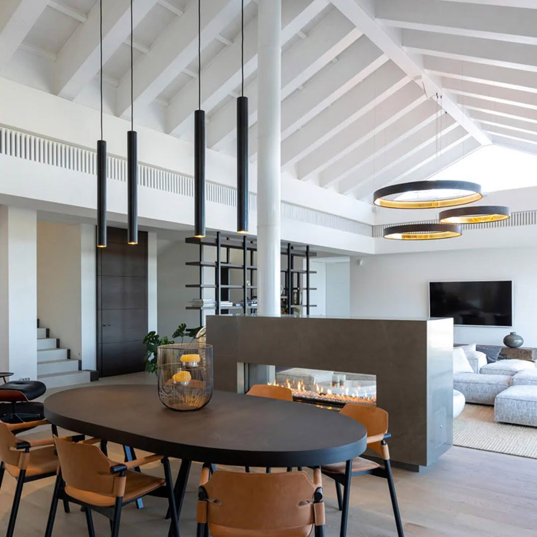 Modern interior with high ceilings and stylish furniture