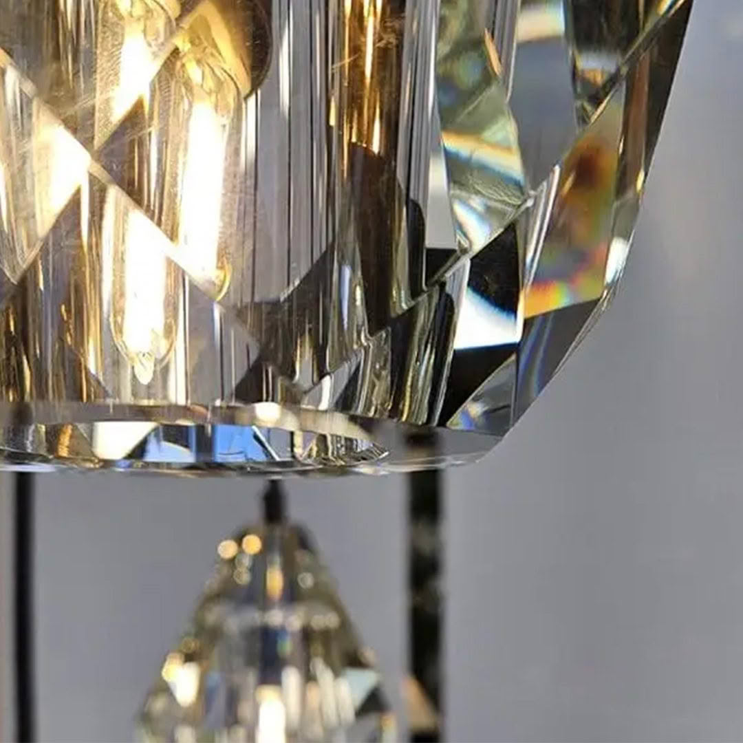 Florence-Chandelier-3-1-e1719352656497 Close-up of illuminated crystal chandelier