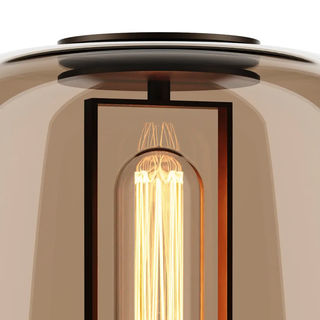 Close-up of illuminated vintage filament bulb