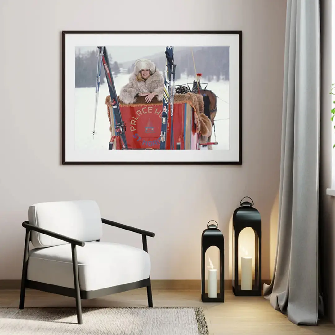 Framed photo of cheerful person in snowy sled ride