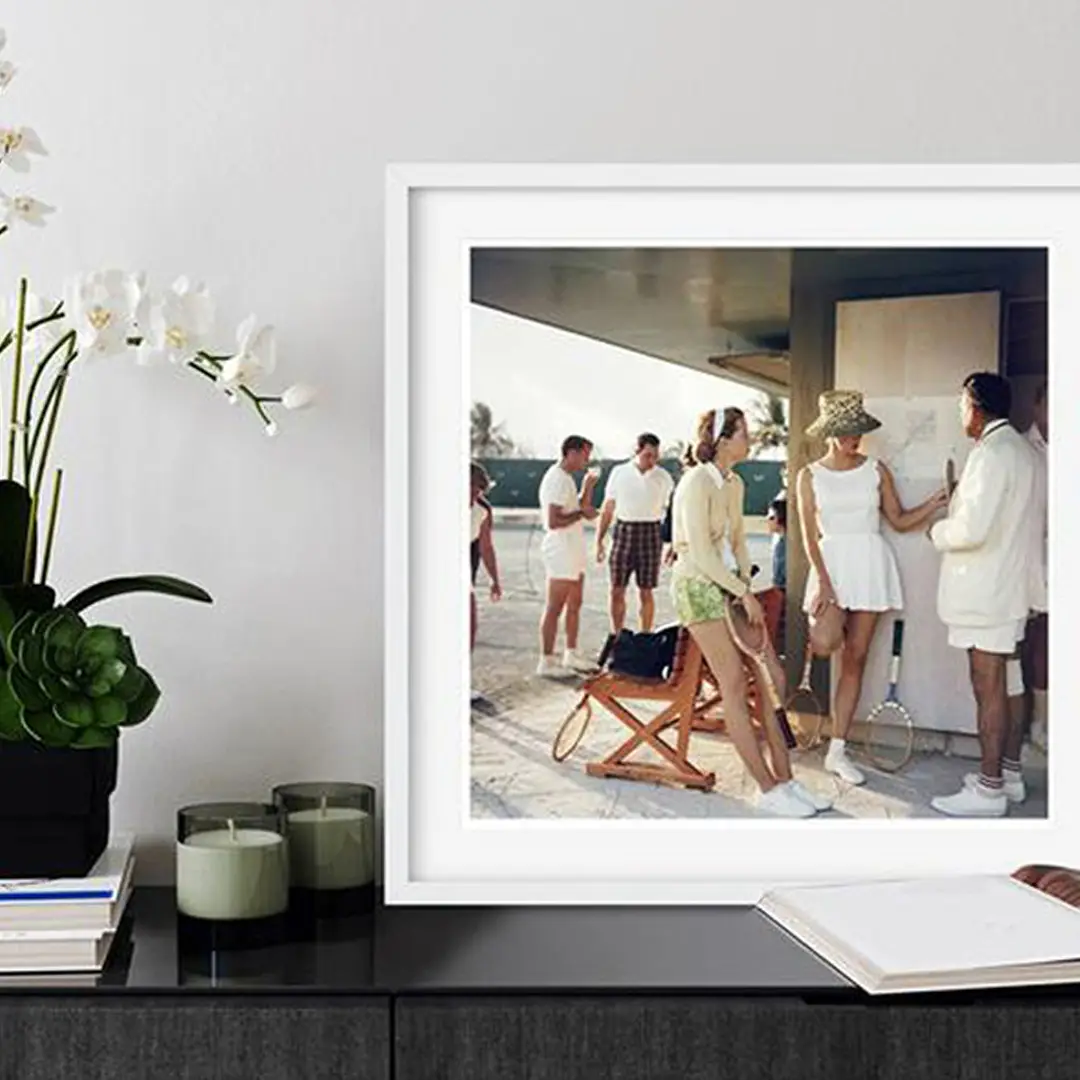 Framed photo of friends at a sunny outdoor gathering
