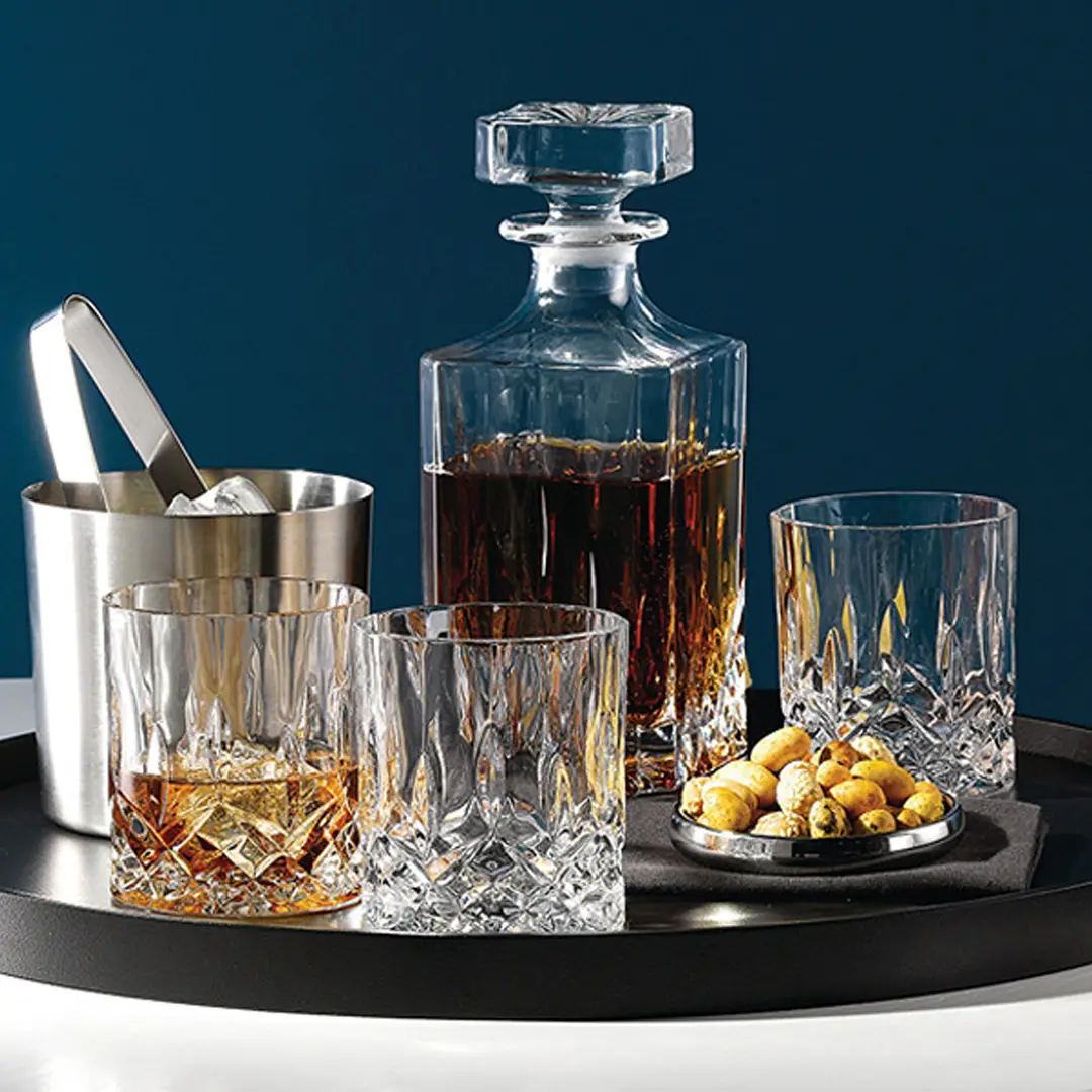 Elegant whiskey set with decanter and glasses on tray