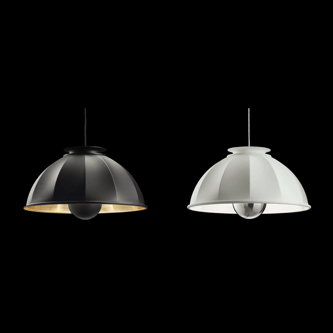 Venetia-Stvdivm-black-white-3 Two modern pendant lights, black and white, against dark background