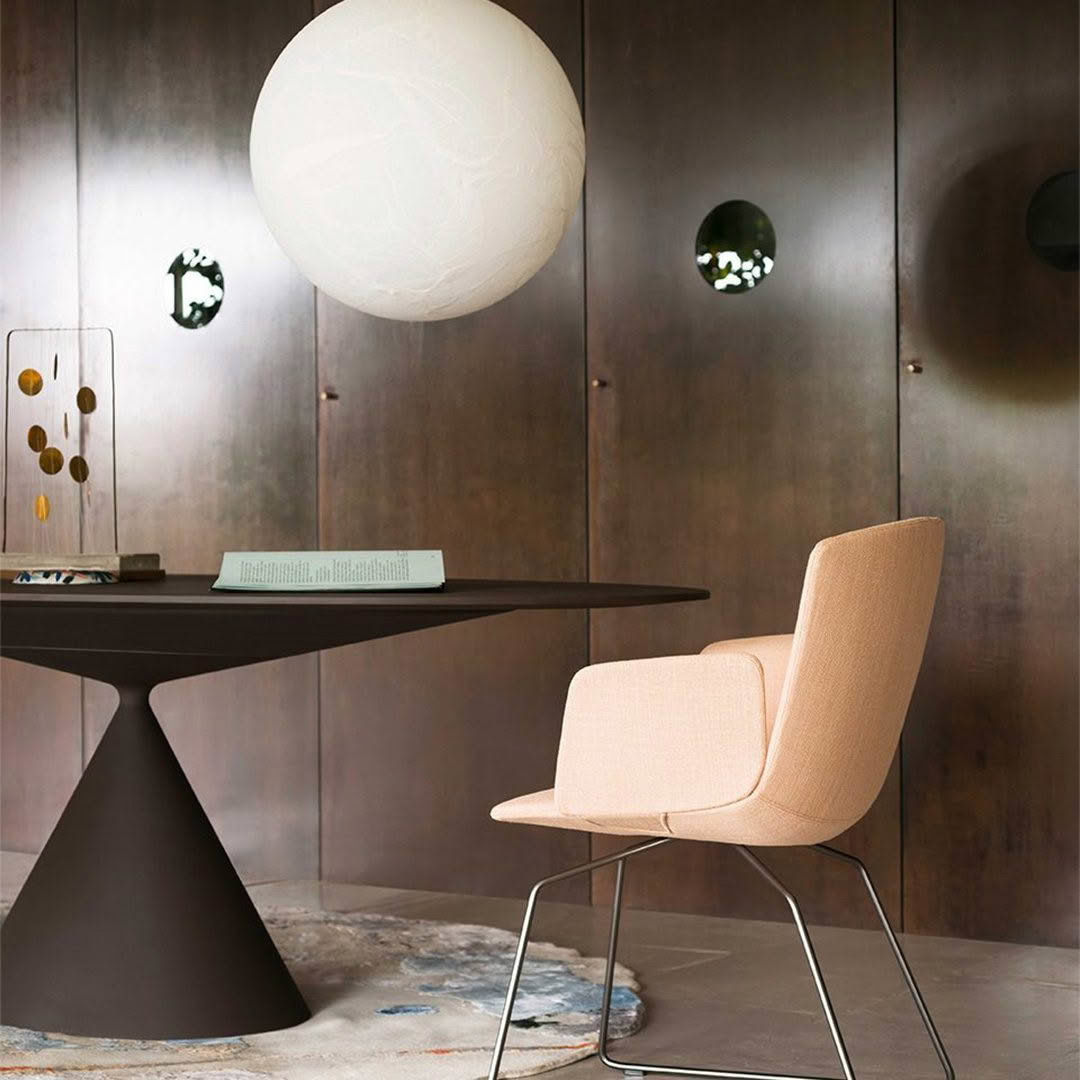 Modern room with stylish chair and unique table