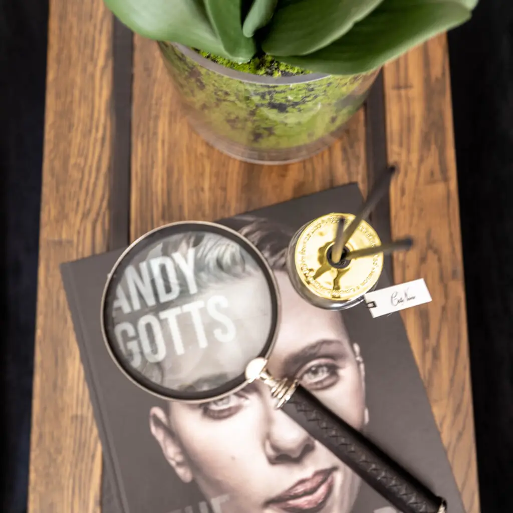 Magnifying glass on Andy Gotts celebrity photography book