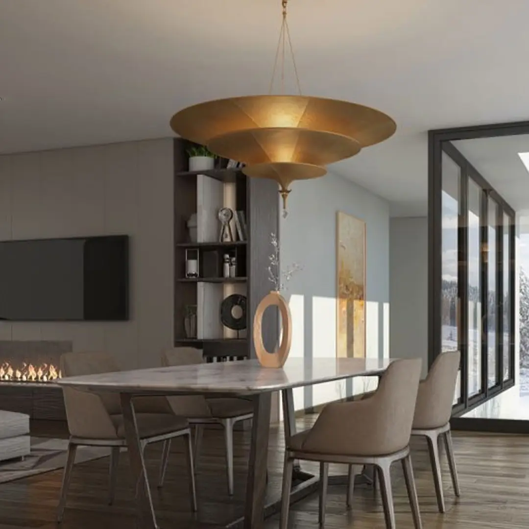 Modern dining room with large golden chandelier and fireplace