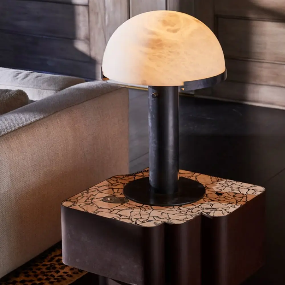 Modern lamp on marbled table in stylish room
