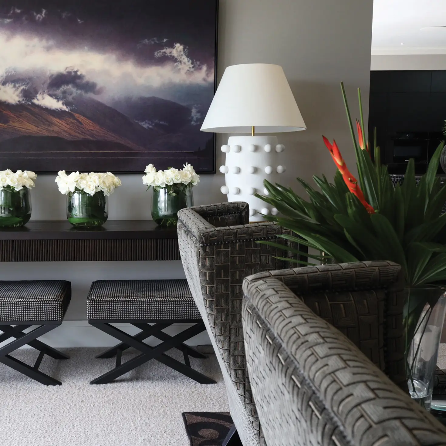 Elegant interior with decorative lamp and mountain painting