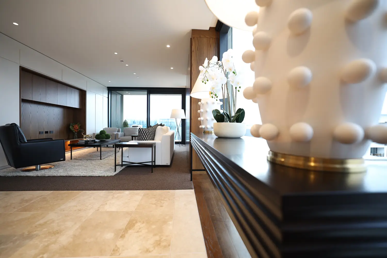 Modern living room interior with cityscape view