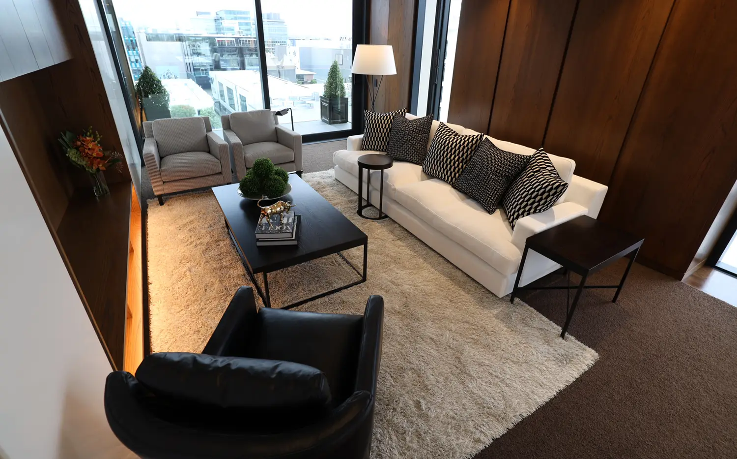 Modern living room with elegant furniture and city view