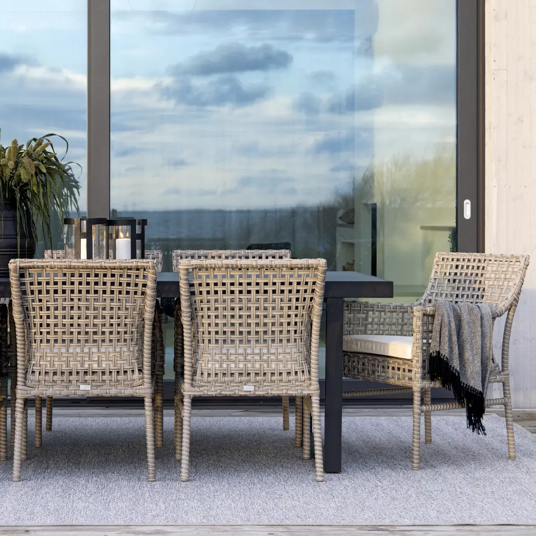 Romano-dining_table_2 Outdoor patio set with wicker chairs and glass table