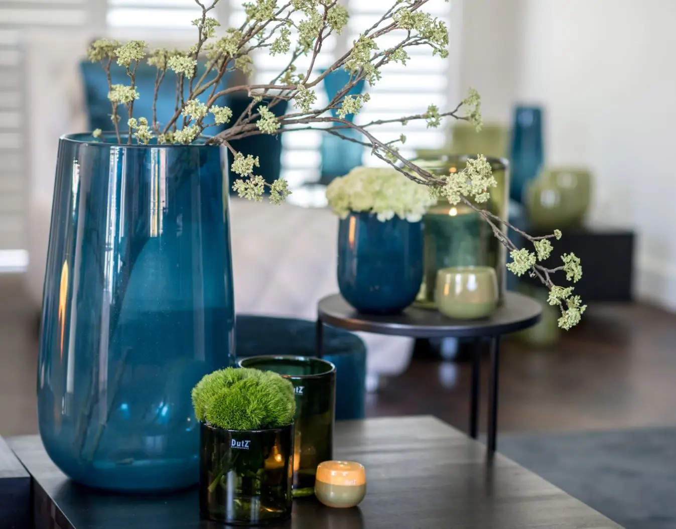 Elegant home decor with blue and green vases