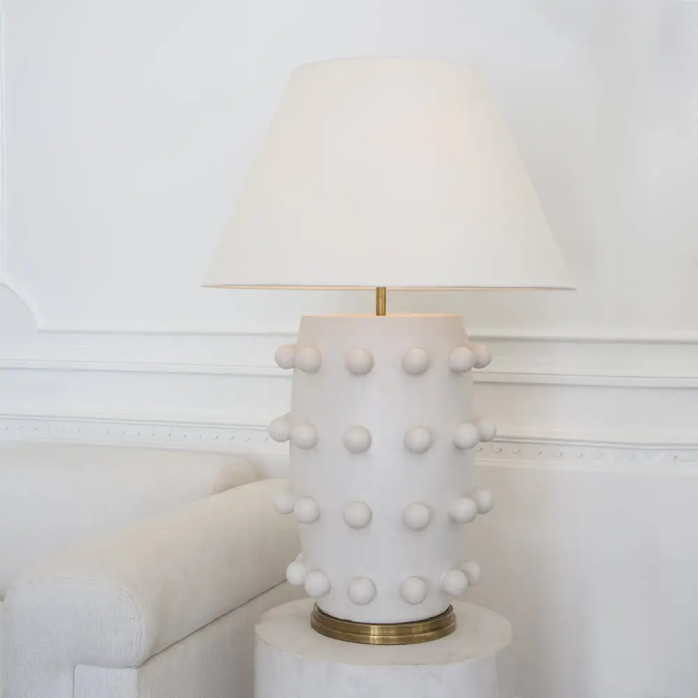 Elegant white table lamp with unique bulbous design
