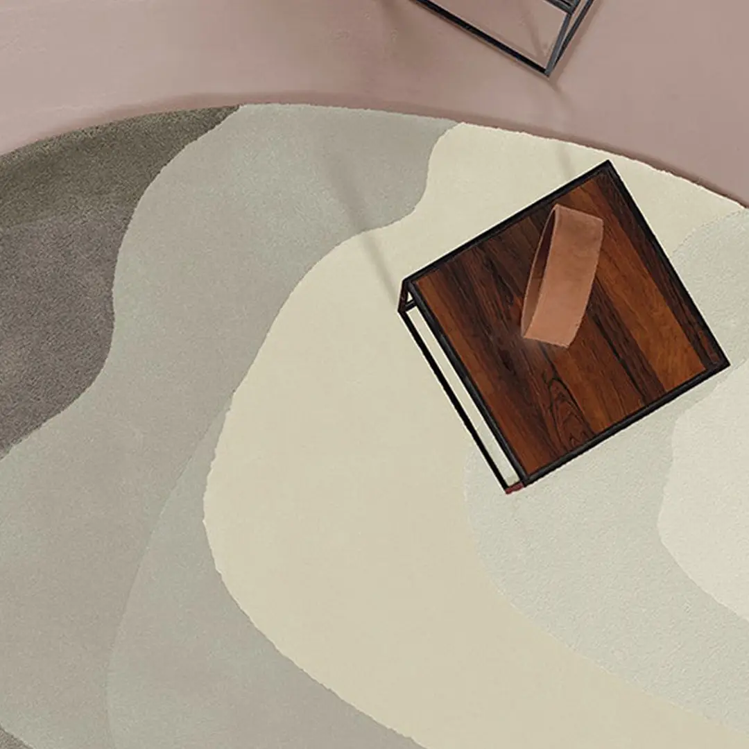 Abstract carpet design with central wooden table