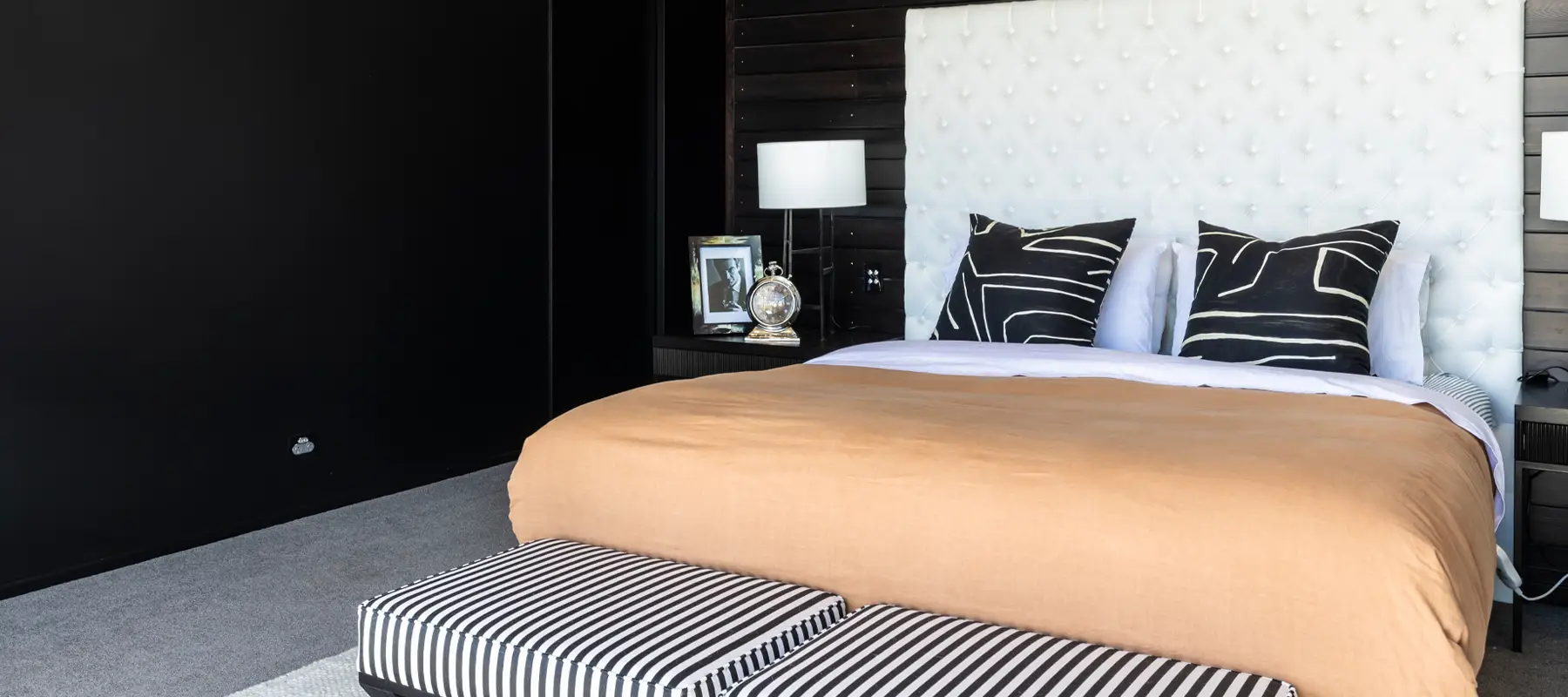 Modern bedroom with large bed and elegant decor