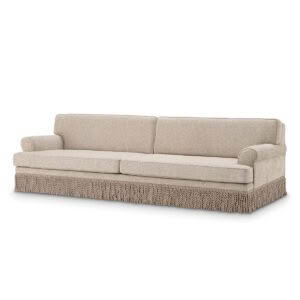 Beige fabric sofa with textured skirt