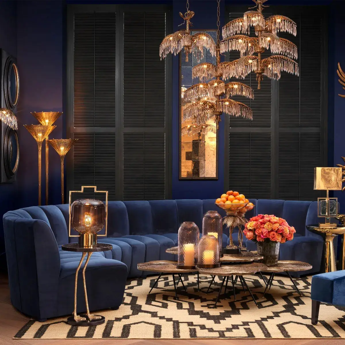 Luxurious blue living room with elegant gold lighting fixtures