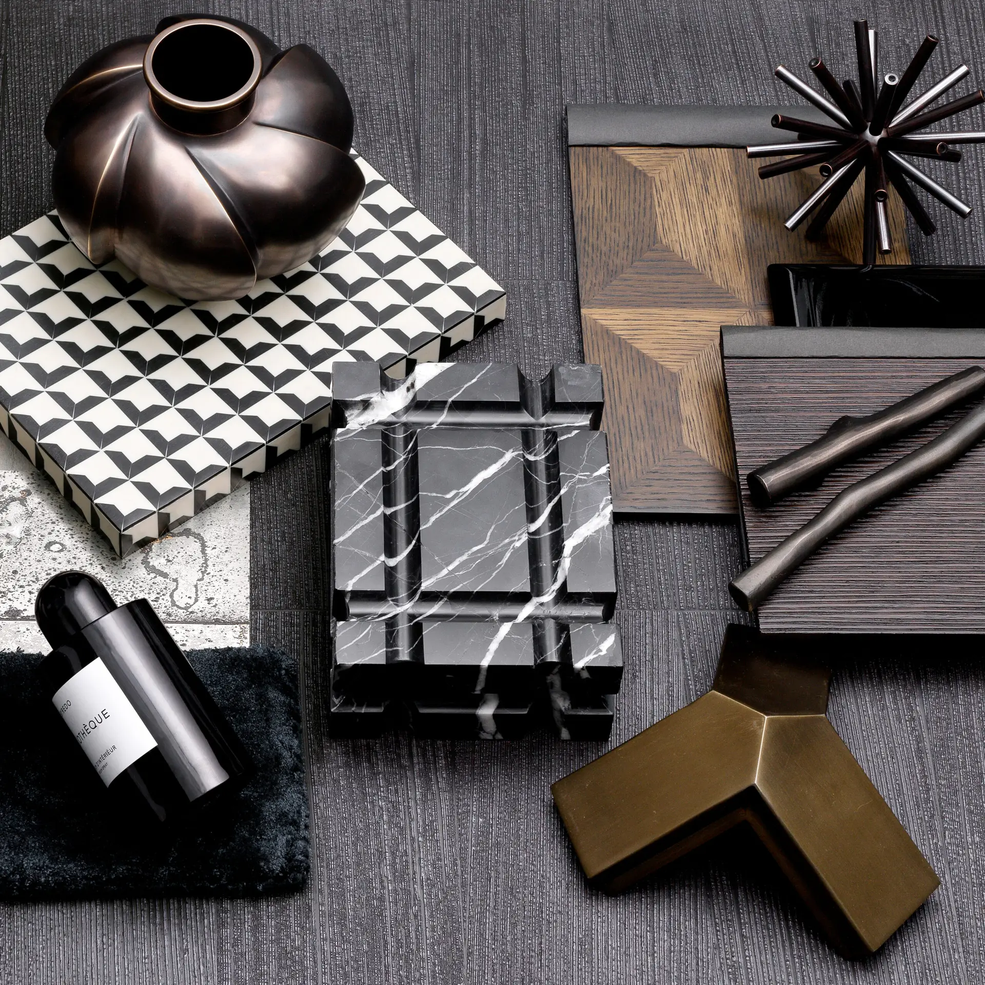 Assorted interior design elements on gray textured background
