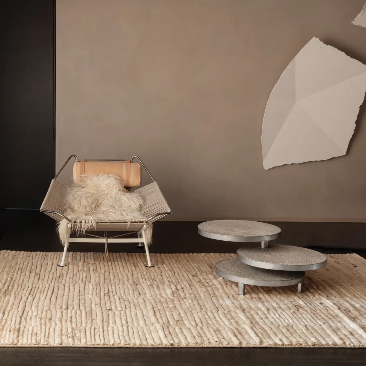 Modern chair and nested tables in stylish living room