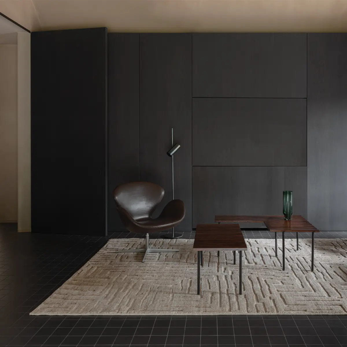 Modern minimalist interior with chair and wooden tables