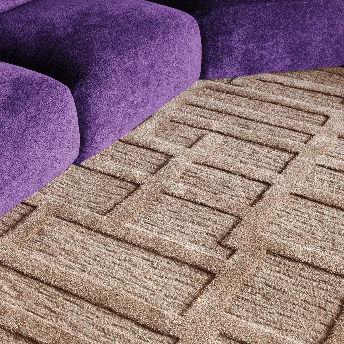 Zumba_Grado_Jojoba_Mocha Purple couch and patterned beige carpet in living room