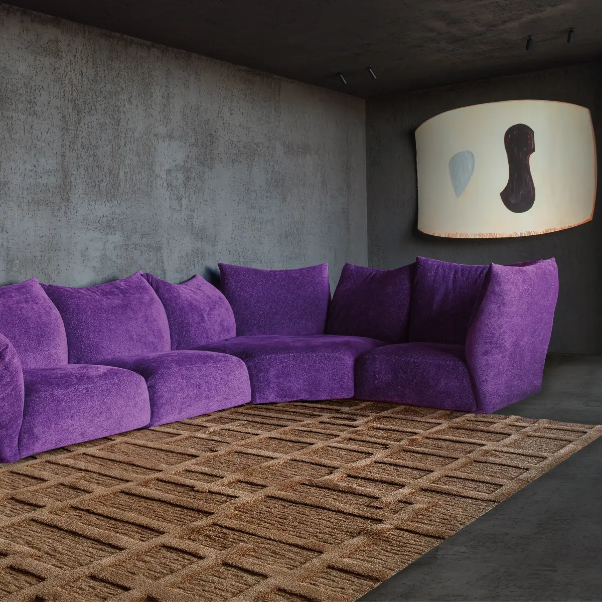 Purple sectional sofa in modern room with abstract art