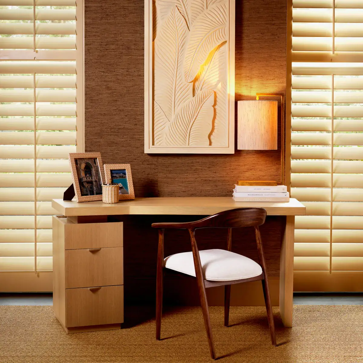 Elegant home office desk setup with warm lighting