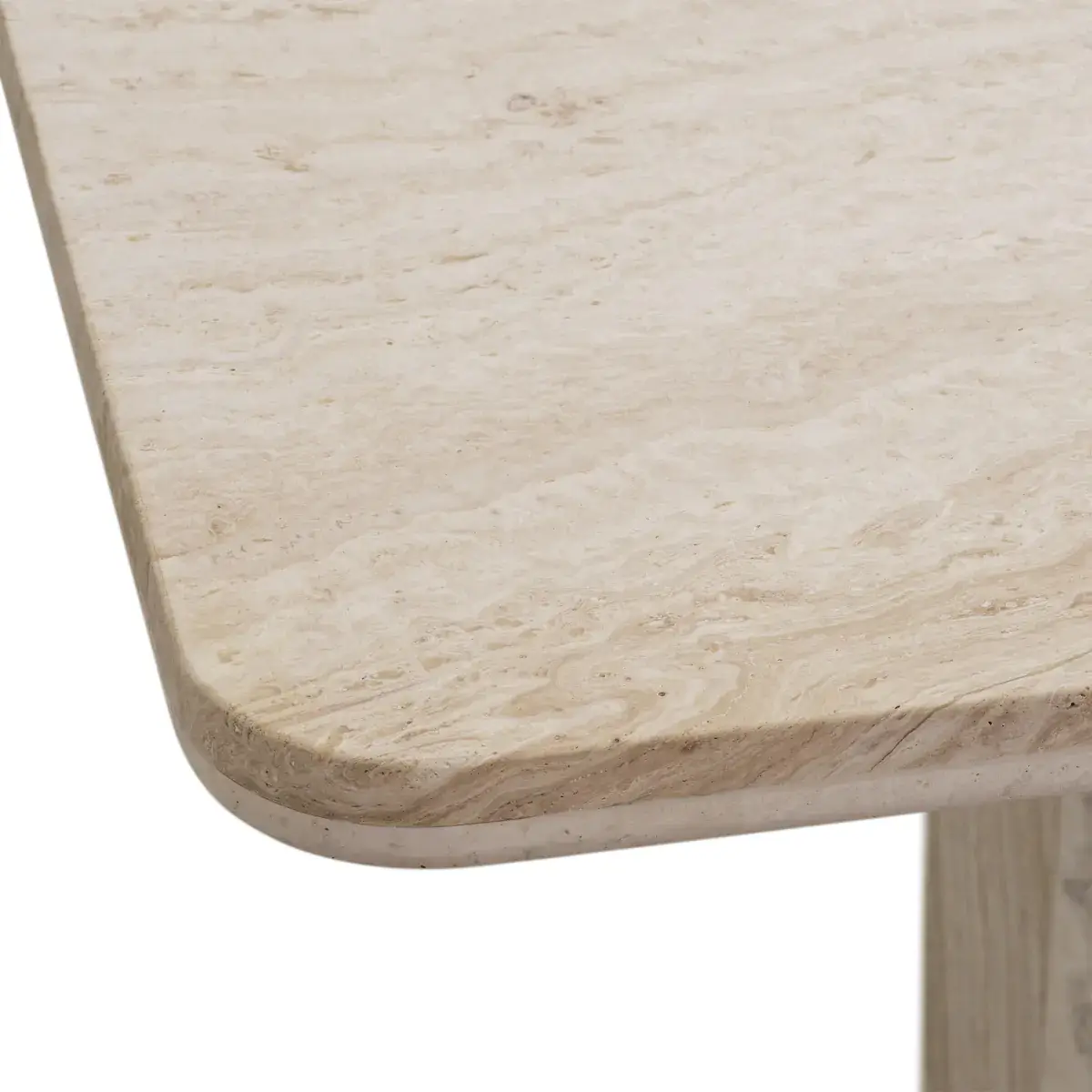 Close-up view of a beige wooden table corner