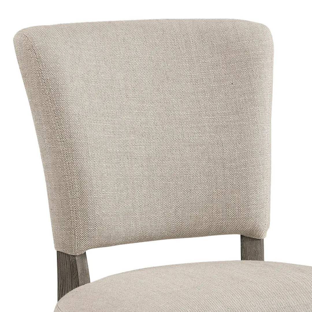 Close-up of textured grey fabric chair back