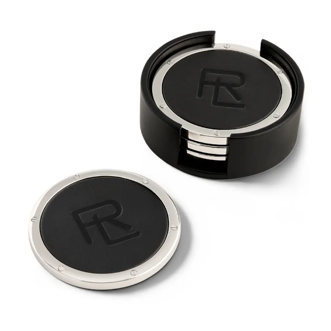 Two round black compact cases with logo