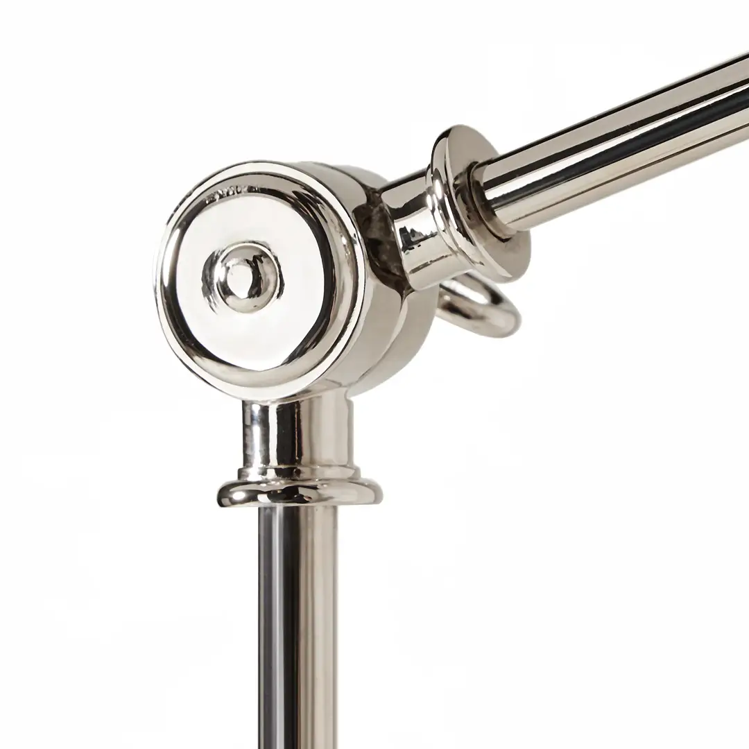Close-up of shiny chrome towel rail joint